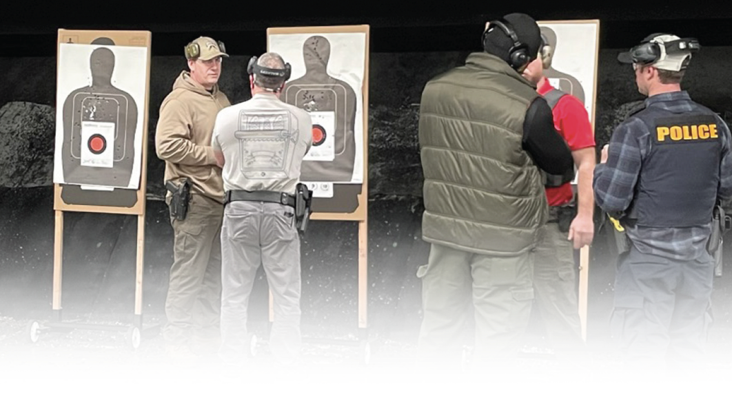 a group of instructors in a fire range