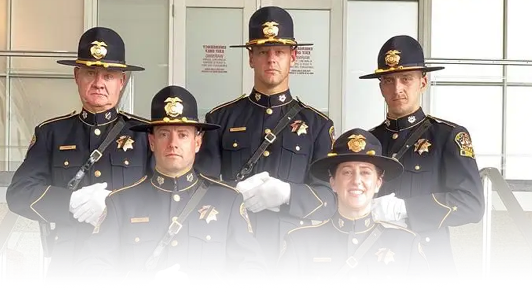 a group of honor men posing for a photo