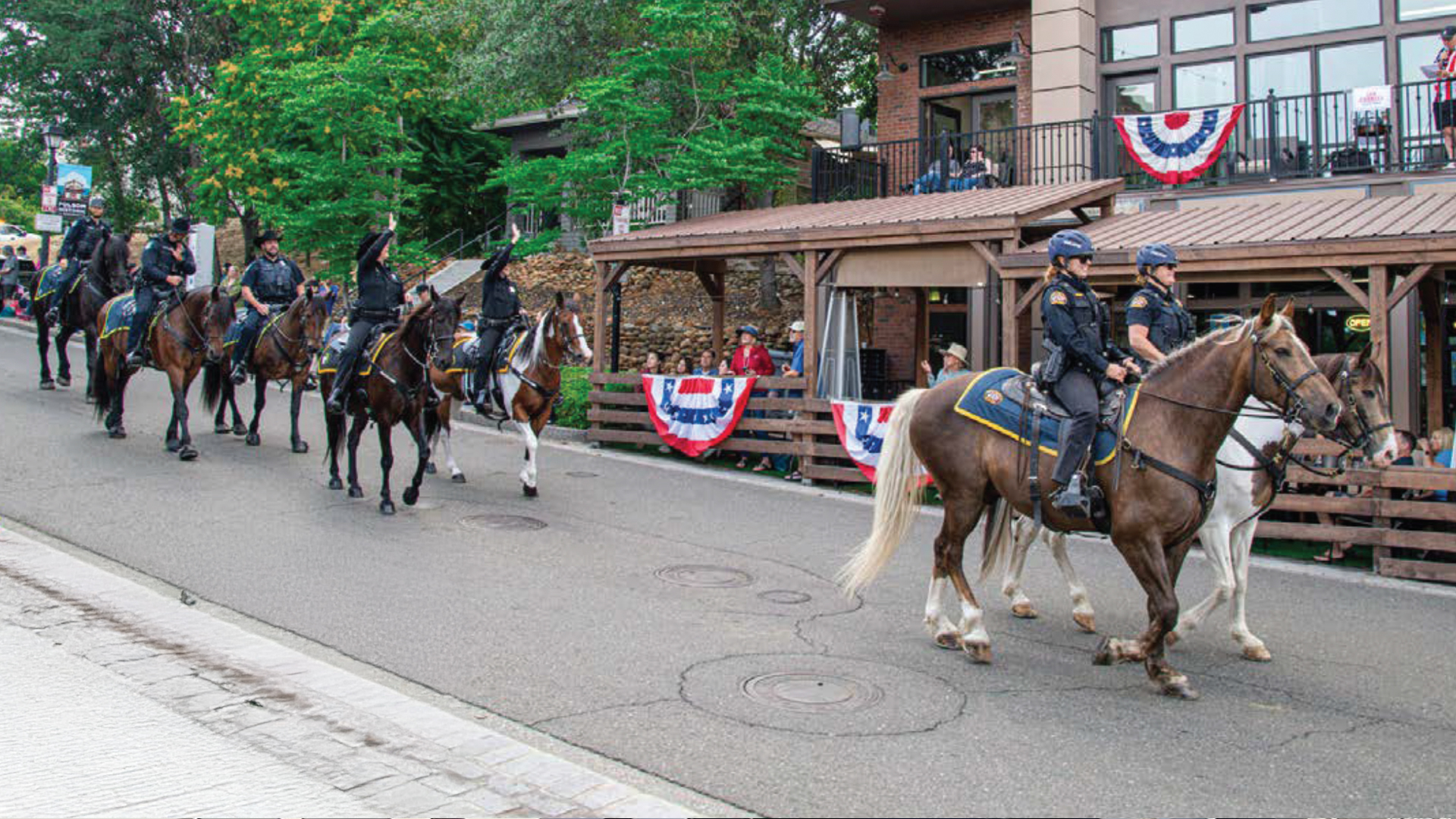 a group of policemen parading on horse