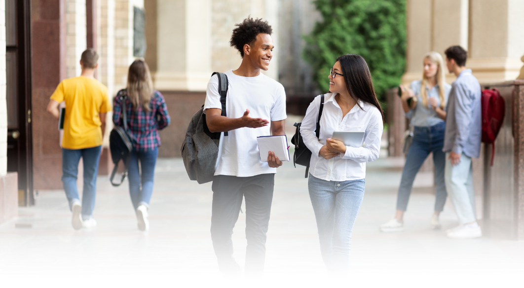 a group of teenagers at school walking and conversing